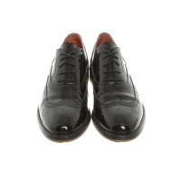 Santoni Chaussures à lacets en Cuir verni en Noir