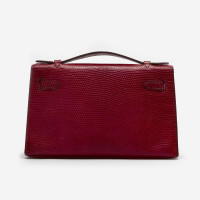 Hermès Kelly Clutch aus Leder in Fuchsia