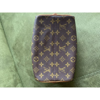 Louis Vuitton Täschchen/Portemonnaie aus Canvas in Braun