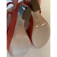 Miu Miu Sandalen aus Leder in Orange