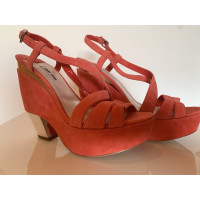 Miu Miu Sandalen aus Leder in Orange