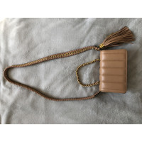 Moschino Handtasche aus Leder in Beige
