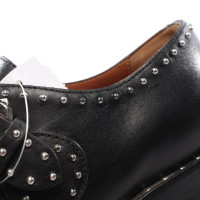 Givenchy Pumps/Peeptoes aus Leder in Schwarz