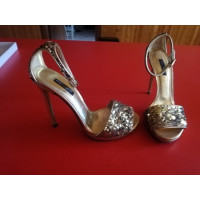 Dolce & Gabbana Sandals Patent leather in Gold