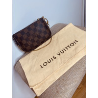 Louis Vuitton Pochette Accessoires aus Canvas in Braun