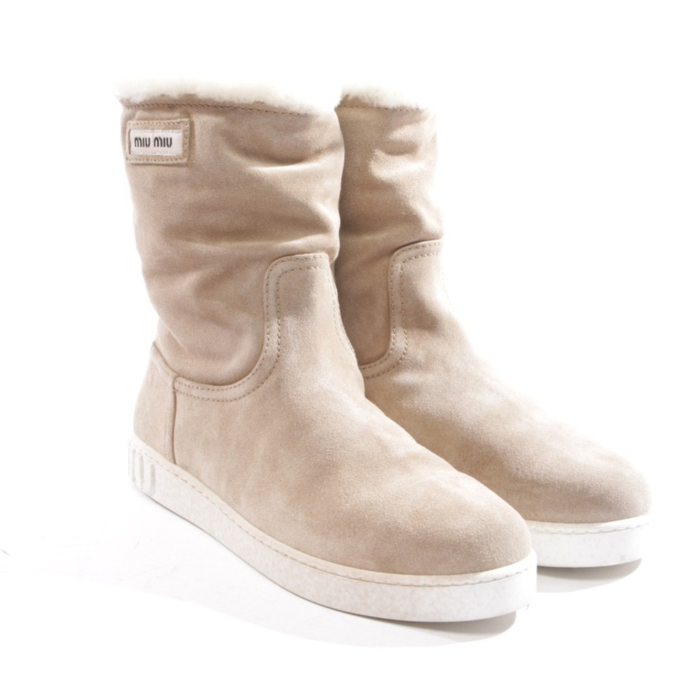 Miu Miu Stiefeletten aus Leder in Beige