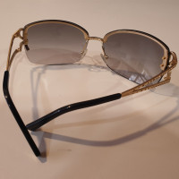 Roberta Di Camerino Sunglasses in Gold
