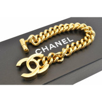 Chanel Armreif/Armband aus Vergoldet in Gelb