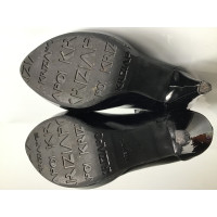 Krizia Pumps/Peeptoes Leather in Black