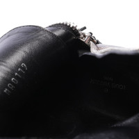 Louis Vuitton Stiefel aus Leder in Braun