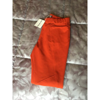 Issey Miyake Trousers in Orange