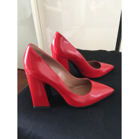 Pollini Pumps/Peeptoes Leather in Red