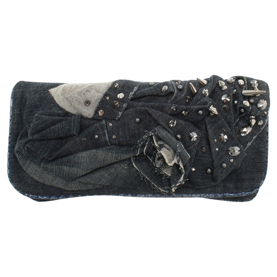 Blessed & Cursed clutch met jeans Drape