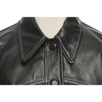 Ganni Jacke/Mantel aus Leder in Schwarz