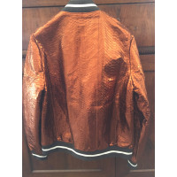 Brunello Cucinelli Jacke/Mantel aus Leder in Orange