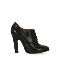 Alaïa Chaussures à lacets en Cuir en Noir