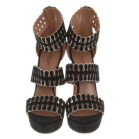 Alaïa High Heels mit dekorativen Riemen