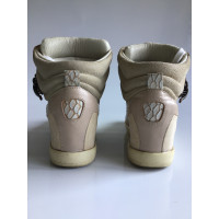 Alexander McQueen Sneakers aus Leder in Creme