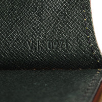 Louis Vuitton Clutch Leer in Bruin