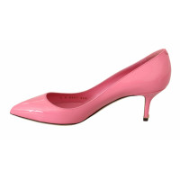 Dolce & Gabbana Pumps/Peeptoes aus Leder in Rosa / Pink