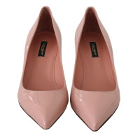 Dolce & Gabbana Pumps/Peeptoes aus Leder in Rosa / Pink