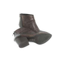 Ovye Ankle boots in Brown