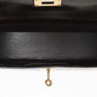 Hermès Kelly Bag 32 aus Leder in Braun