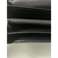 Pollini Täschchen/Portemonnaie aus Leder in Schwarz