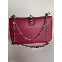 Valentino Garavani Lock Leer in Fuchsia