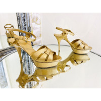 Yves Saint Laurent Sandals Patent leather in Gold