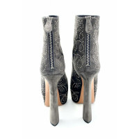 Alaïa Pumps/Peeptoes aus Leder in Grau