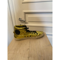 Golden Goose Sneaker in Oro