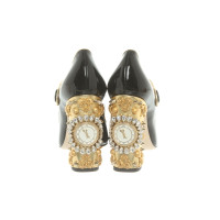 Dolce & Gabbana Pumps/Peeptoes aus Lackleder in Schwarz