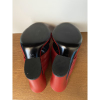 Gucci Pumps/Peeptoes aus Leder in Rot
