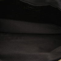 Yves Saint Laurent Clutch aus Lackleder in Schwarz