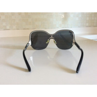 Miu Miu Sunglasses in Black
