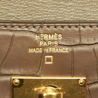 Hermès Kelly Wallet aus Leder in Braun