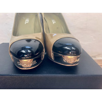 Chanel Pumps/Peeptoes Patent leather in Olive
