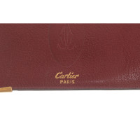 Cartier Täschchen/Portemonnaie aus Lackleder in Bordeaux