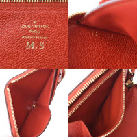 Louis Vuitton Täschchen/Portemonnaie aus Leder in Rot
