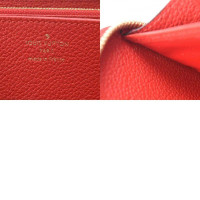 Louis Vuitton Zippy Portemonnaie aus Canvas in Rot