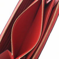 Louis Vuitton Zippy Portemonnaie en Toile en Rouge