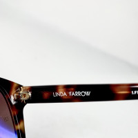Linda Farrow Lunettes de soleil en Marron
