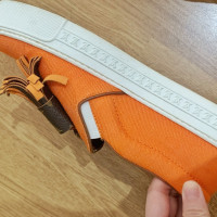 Louis Vuitton Sneakers aus Leder in Orange