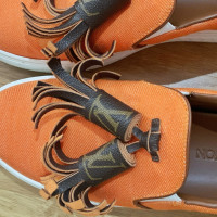 Louis Vuitton Sneakers aus Leder in Orange
