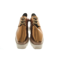 Stella McCartney Lace-up shoes in Gold