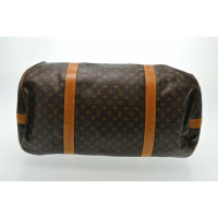 Louis Vuitton Reistas Canvas in Bruin