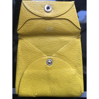 Hermès Täschchen/Portemonnaie aus Leder in Gelb