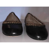 Giuseppe Zanotti Slipper/Ballerinas aus Leder in Schwarz