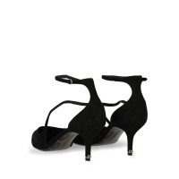 Dolce & Gabbana Pumps/Peeptoes aus Leder in Schwarz